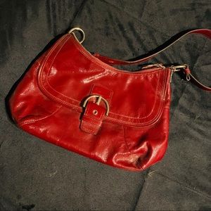 Beautiful red Coach purse. shoulder or cross body.